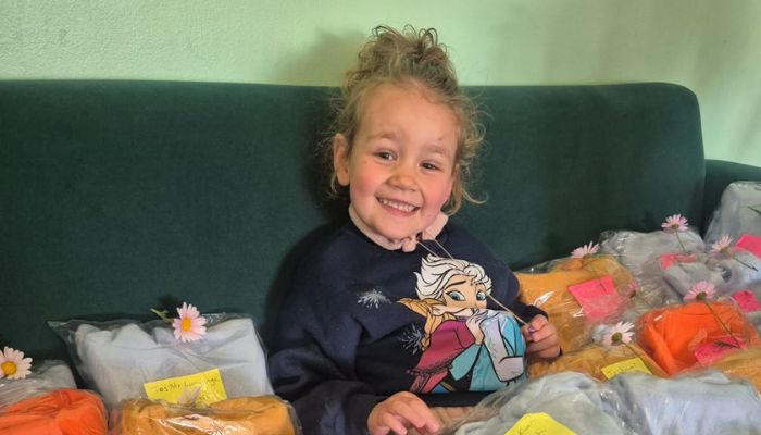 Emilly Delivering Hoodies.jpg